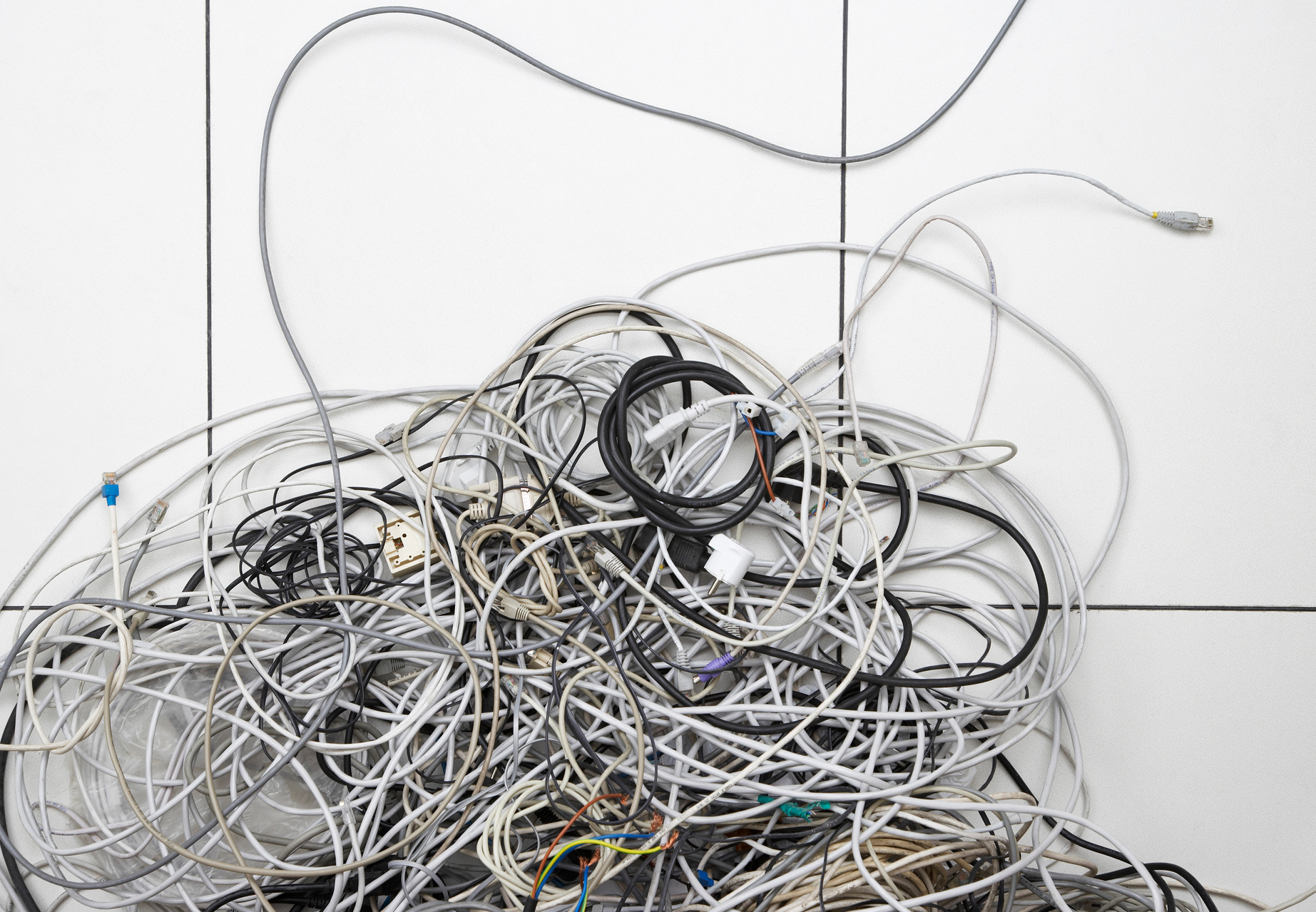 Tangle of computer wires in office